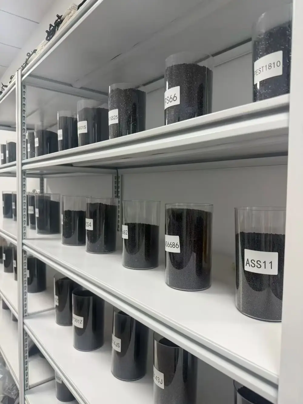 Masterbatch sample rack with labeled pellet lots